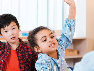 K-12 students engaged in collaborative classroom learning