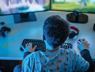 k-12 student playing video games for educational benefit
