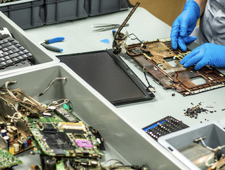 Person working to break down devices
