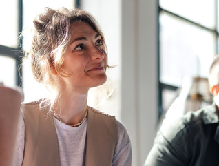 Young Professionals Collaborating in Modern Co-Working Space