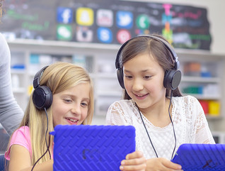 Elementary students using technology at school