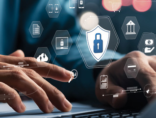 IT admin setting up internet safety policies and monitoring, represented by floating security icons