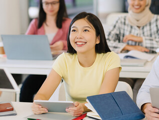 Students using devices in the classroom