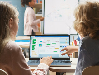 Two students evaluating cost of cloud programs