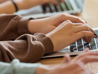 students on laptops
