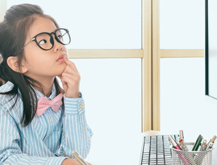 Student using computer at home