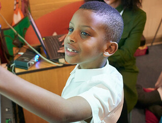 Student using interactive whiteboard