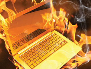 computer generated image of laptop on fire