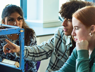 k–12 students working on school stem vs steam project