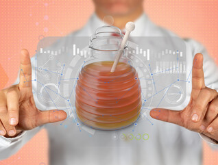 digital honeypot concept with peach colored background