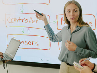 Students using an interactive board