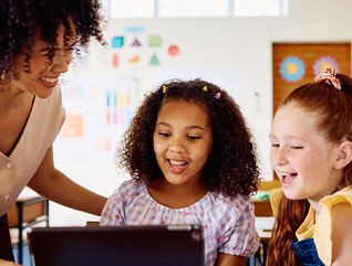 Students using tech in the classroom