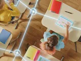 Students using tech in the classroom