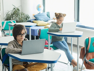 Students using devices in classroom