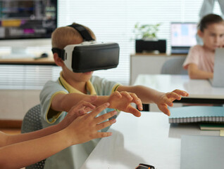 Kids using VR headsets