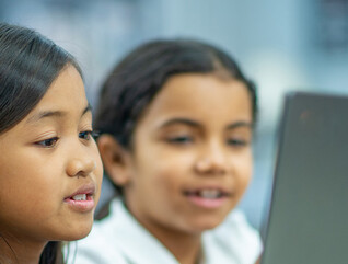 Students using a computer