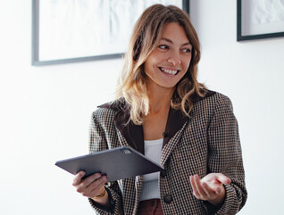 Professional holding a tablet