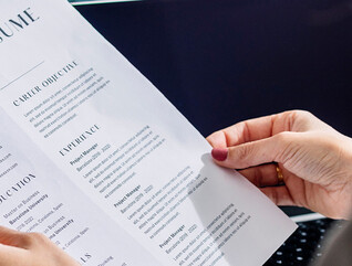 Person reviewing resume