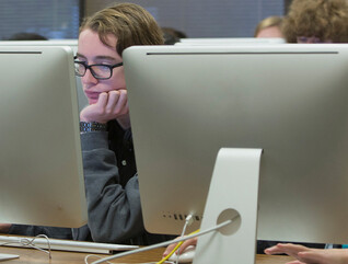 Students using computers in school