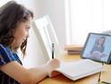 girl using tablet for school