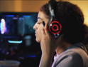 K–12 student playing esports with headset