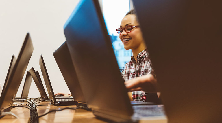 students on laptops