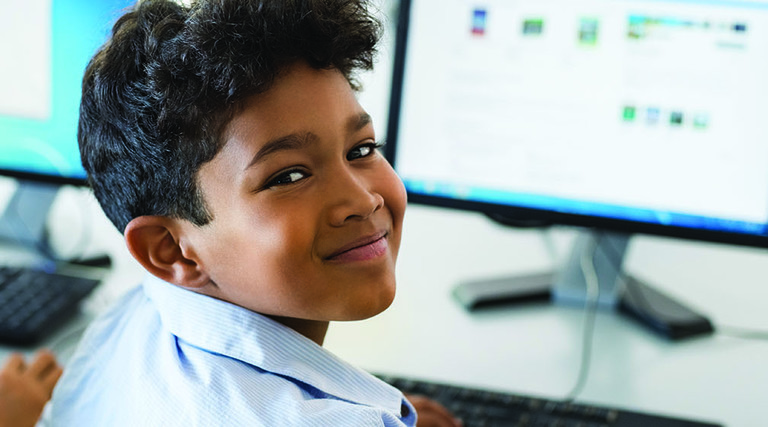 boy using computer