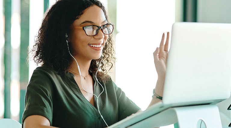 woman videoconferencing via laptop