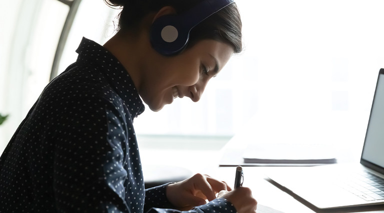 young woman using laptop