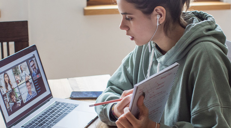 girl student learning from home using laptop