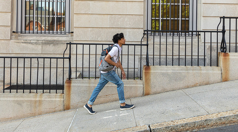 Student walking uphill