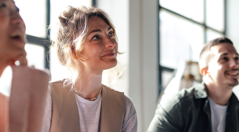 Young Professionals Collaborating in Modern Co-Working Space