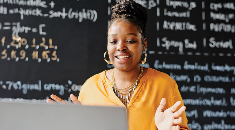 Teacher giving lesson virtually