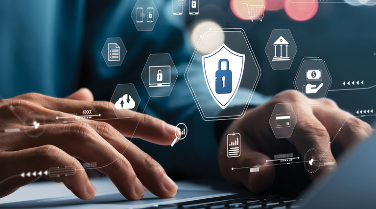 IT admin setting up internet safety policies and monitoring, represented by floating security icons