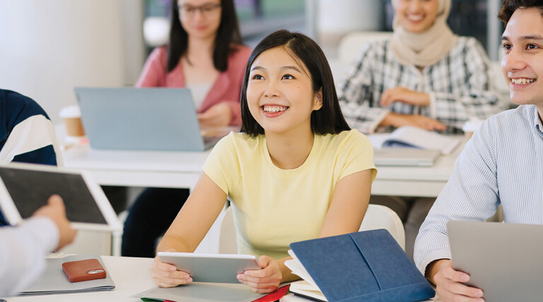 Students using devices in the classroom