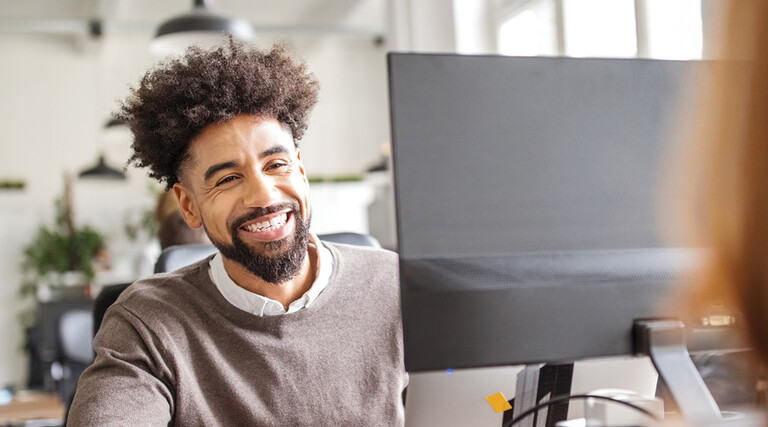 IT professional looking at computer