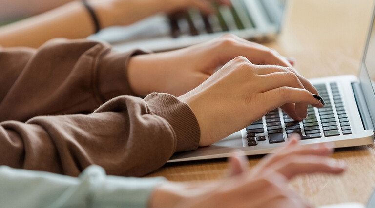 students on laptops