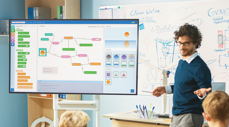 teacher in a classroom teaching