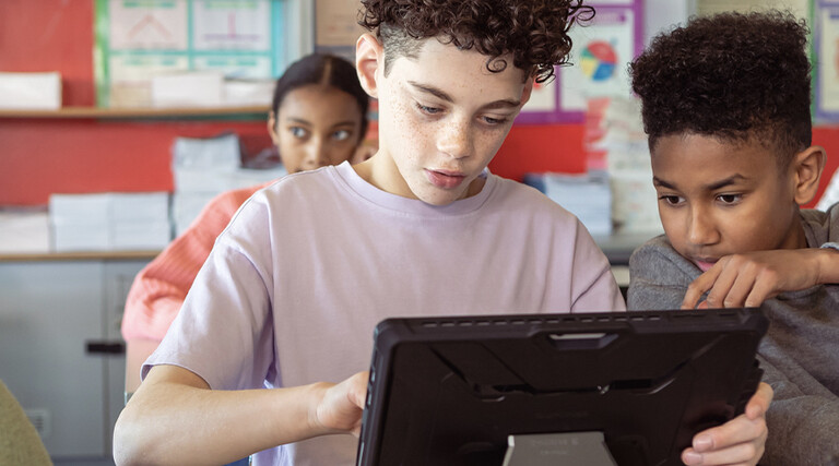 Kids working on group assignment during class