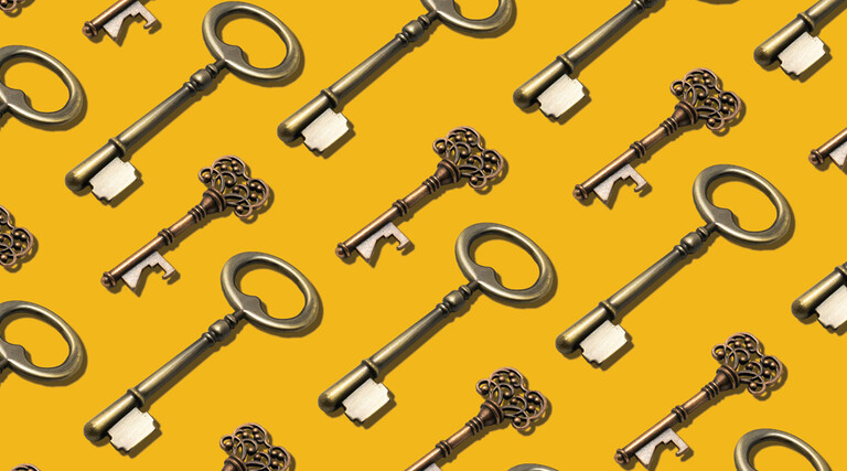 a repeating pattern of keys on a yellow background to represent passkeys
