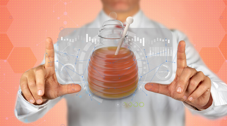 digital honeypot concept with peach colored background