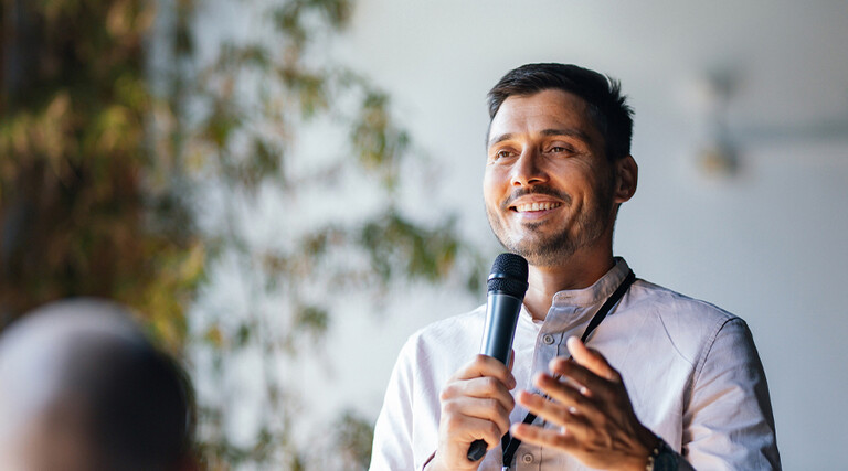 Person speaking at event