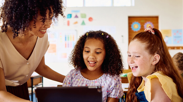 Students using tech in the classroom