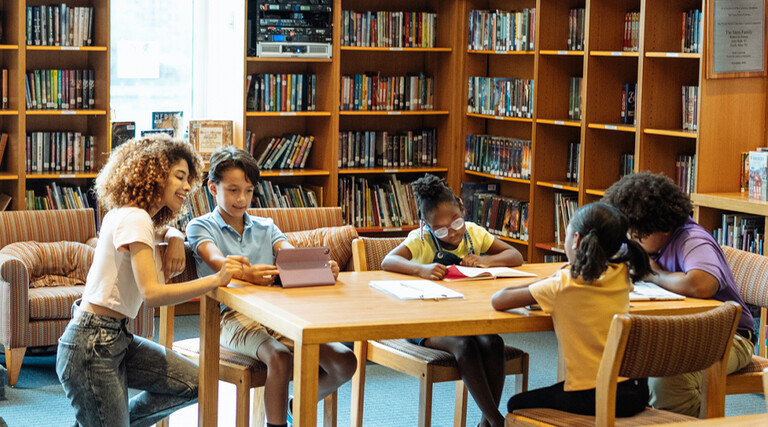 Students reading in library