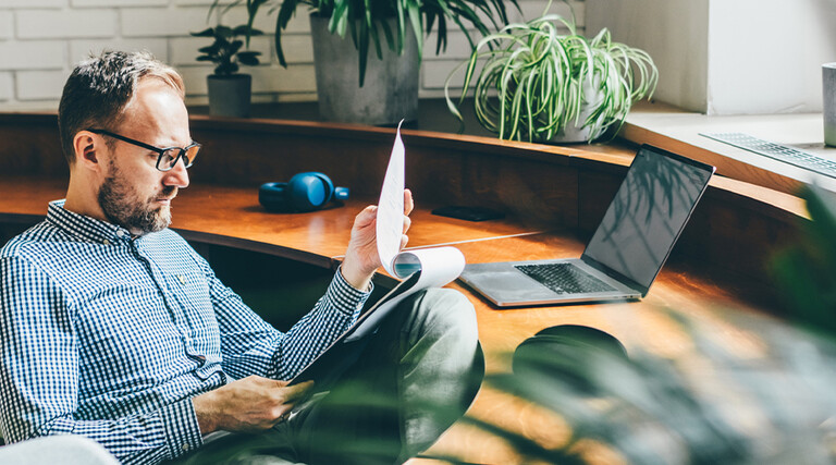 Person reviewing documents