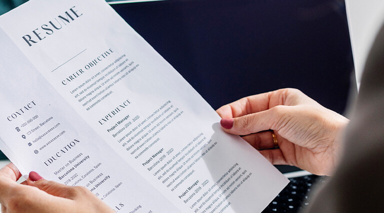 Person reviewing resume