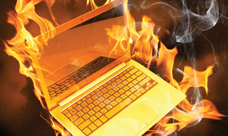 computer generated image of laptop on fire