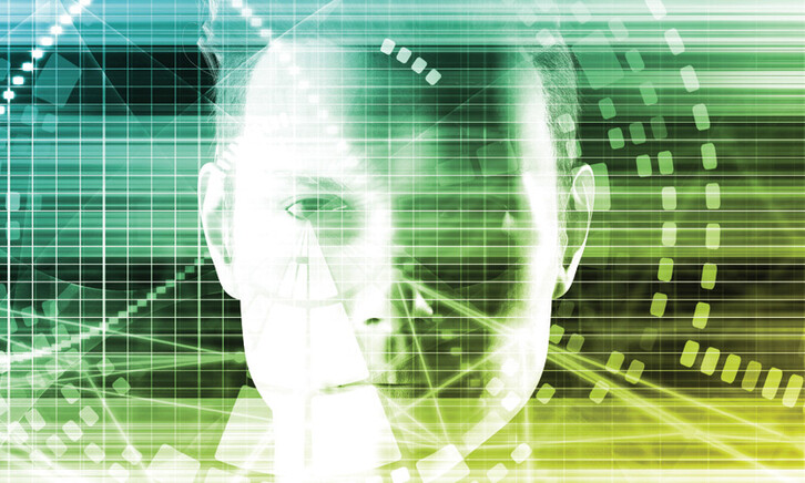 Portrait of person obscured by technology overlay to symbolize cybersecurity and physical security