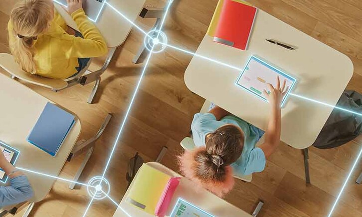 Students using tech in the classroom