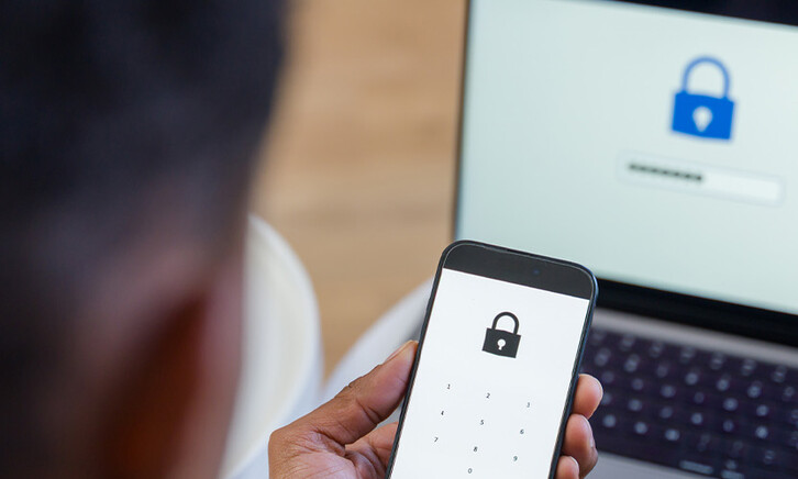 Person using MFA at login